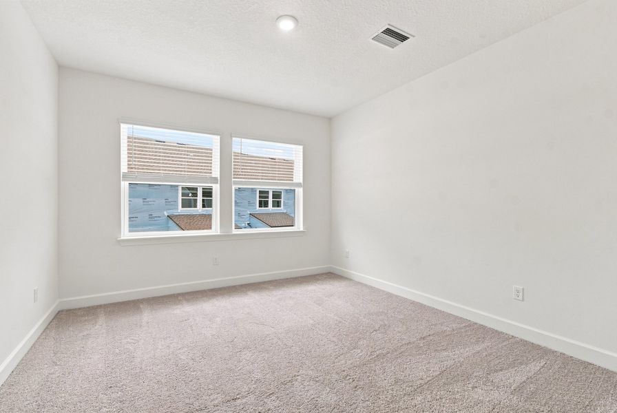 Representative unfurnished interior of a home built from the The Burney by David Weekley Homes in Westerly Park at Wildlight – Overlook Collection, Yulee (Image 8).