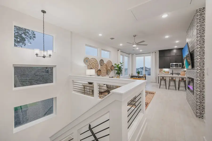 Representative furnished interior of a home built from the Athena by Chesmar Homes in Santa Rita Ranch, Liberty Hill (Image 3).