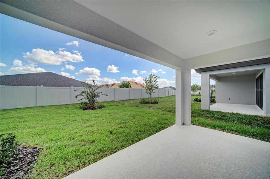 Exterior details and patio area of a home in Crosswind Point, Parrish (Image 15).