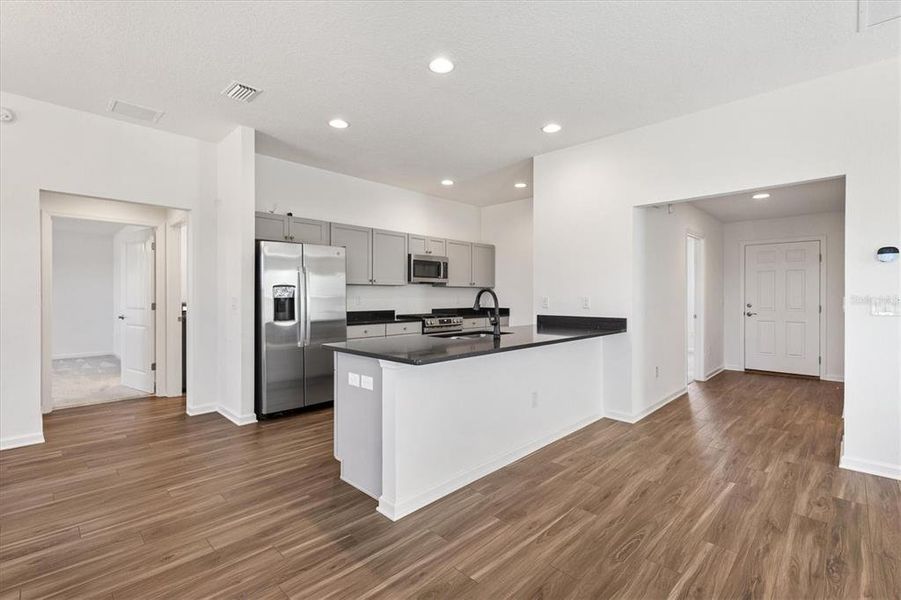 Furnished interior view inside a new home in , The Villages (Image 6).