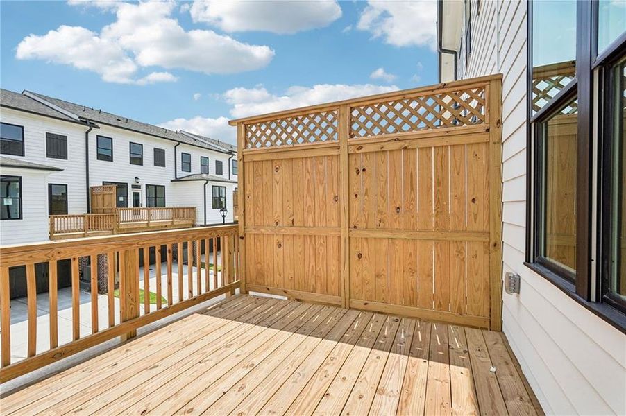 Exterior details and patio area of a home in Millcroft Townhomes, Buford (Image 4). Exterior details and patio area of a home in Millcroft Townhomes, Buford (Image 4).