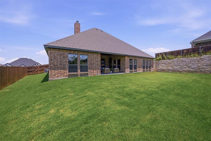 Exterior details and patio area of a home in , Benbrook (Image 24). Exterior details and patio area of a home in , Benbrook (Image 24).
