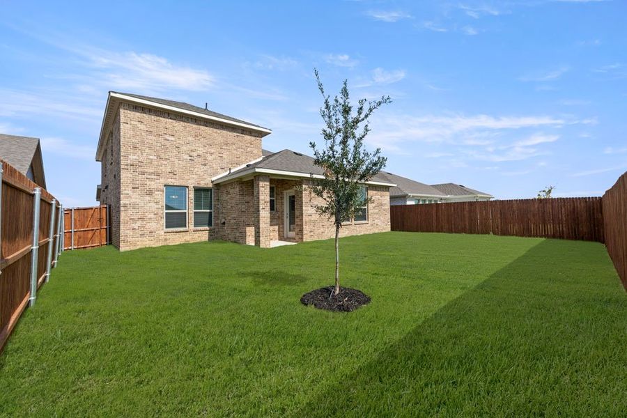 Front exterior of a new home in Northspur, Terrell, TX, highlighting curb appeal (Image 29). Front exterior of a new home in Northspur, Terrell, TX, highlighting curb appeal (Image 29).