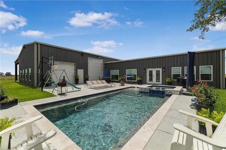 Exterior details and patio area of a home in , Yoakum (Image 20).