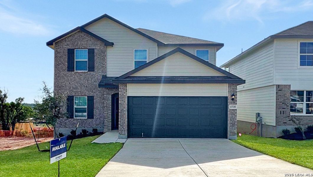 Front exterior of a new home in The Canyons at Amhurst, San Antonio, TX, highlighting curb appeal (Image 2).
