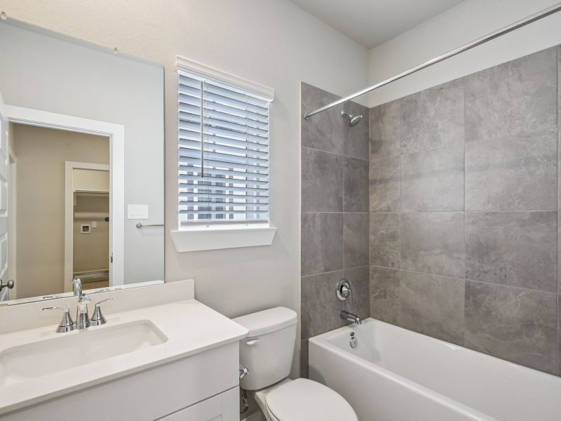 Furnished interior view inside a new home in Pinewood Trails - City Series, Atascocita (Image 9).
