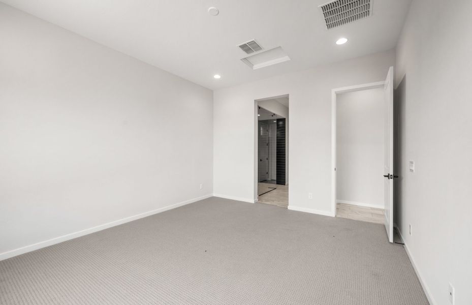 Spacious, unfurnished interior of a new home in Legado West, Queen Creek (Image 21).