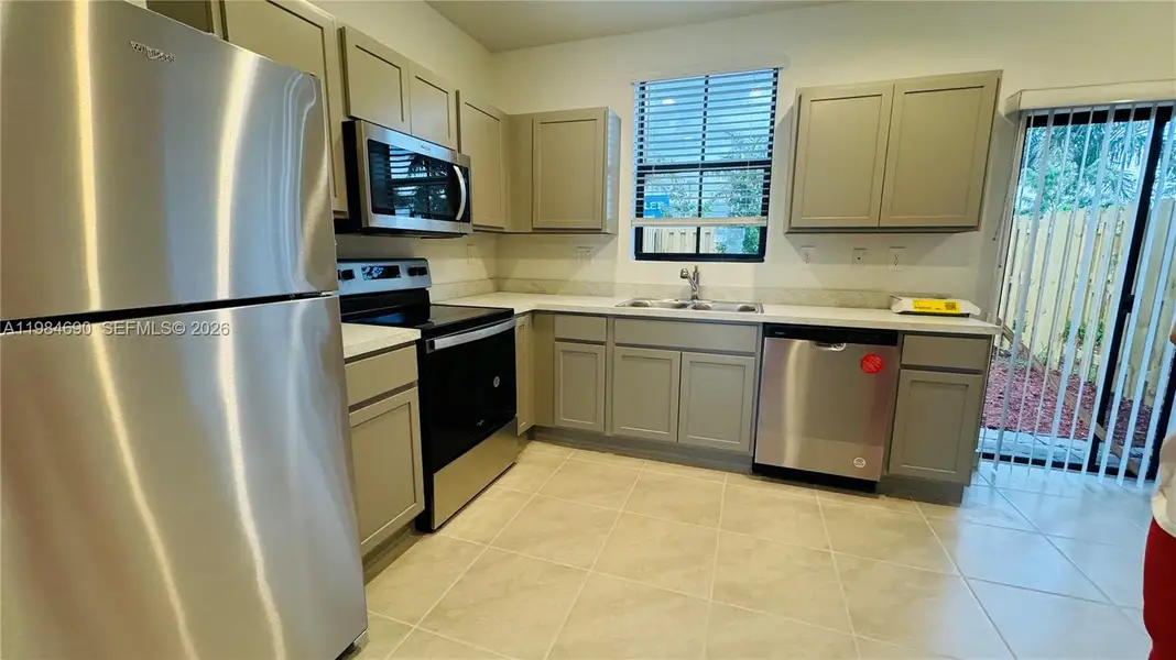 Furnished interior view inside a new home in , Florida City (Image 13).