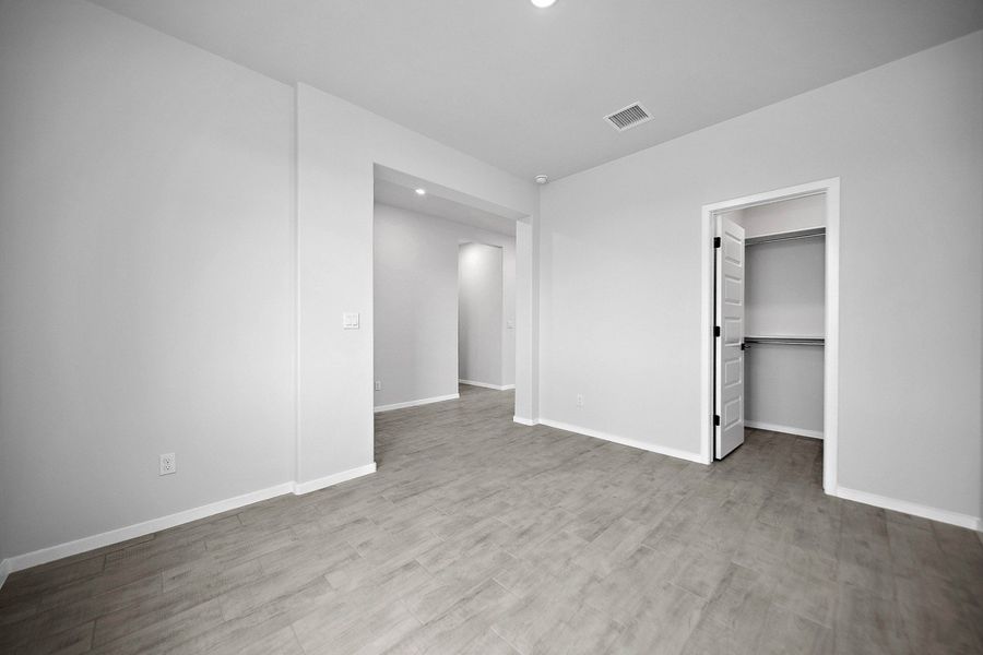 Representative unfurnished interior of a home built from the Capitan by Hakes Brothers in Summer Sky North, El Paso (Image 11).