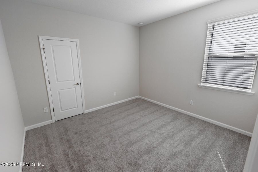 Spacious, unfurnished interior of a new home in Lakes at Bella Lago, Green Cove Springs (Image 18).