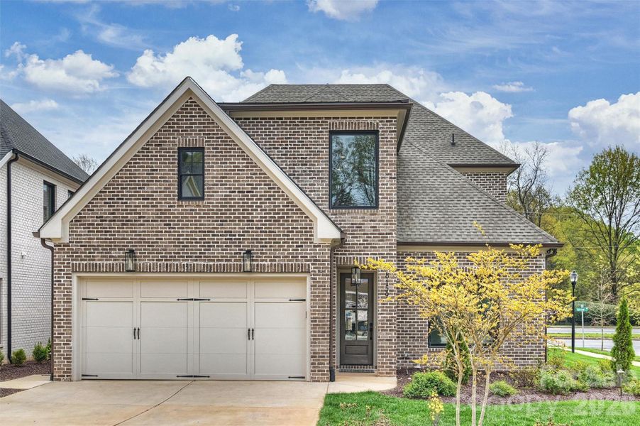 Front exterior of a new home in , Charlotte, NC, highlighting curb appeal (Image 2). Front exterior of a new home in , Charlotte, NC, highlighting curb appeal (Image 2).