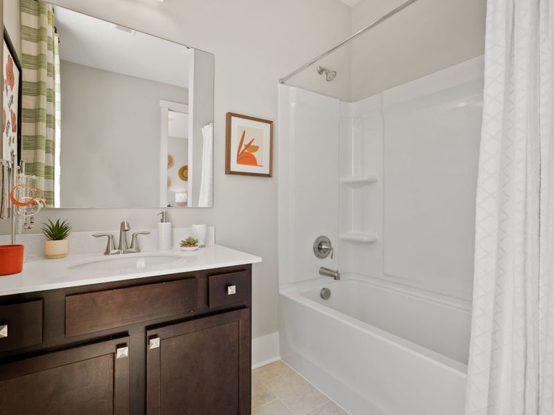 Representative furnished interior of a home built from the Riley P by True Homes in Homecoming, Ravenel (Image 17).