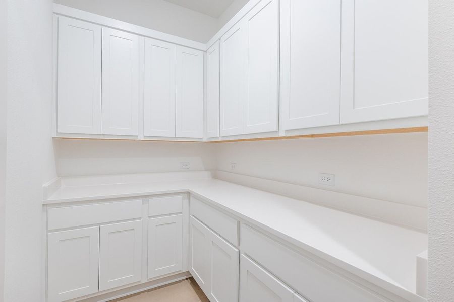 Furnished interior view inside a new home in Hilltop Ranch, Leander (Image 34).