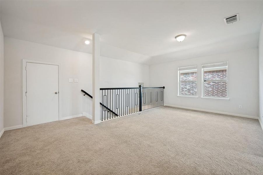 Spacious, unfurnished interior of a new home in The Villages of Hurricane Creek, Anna (Image 21).