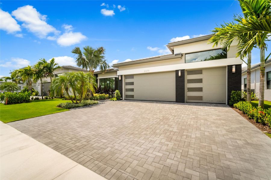 Front exterior of a new home in , Boca Raton, FL, highlighting curb appeal (Image 30). Front exterior of a new home in , Boca Raton, FL, highlighting curb appeal (Image 30).