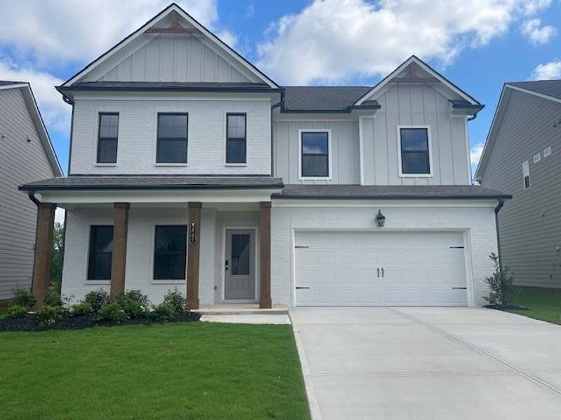 Front exterior of a new home in Ponderosa Farms Estates, Gainesville, GA, highlighting curb appeal (Image 17).