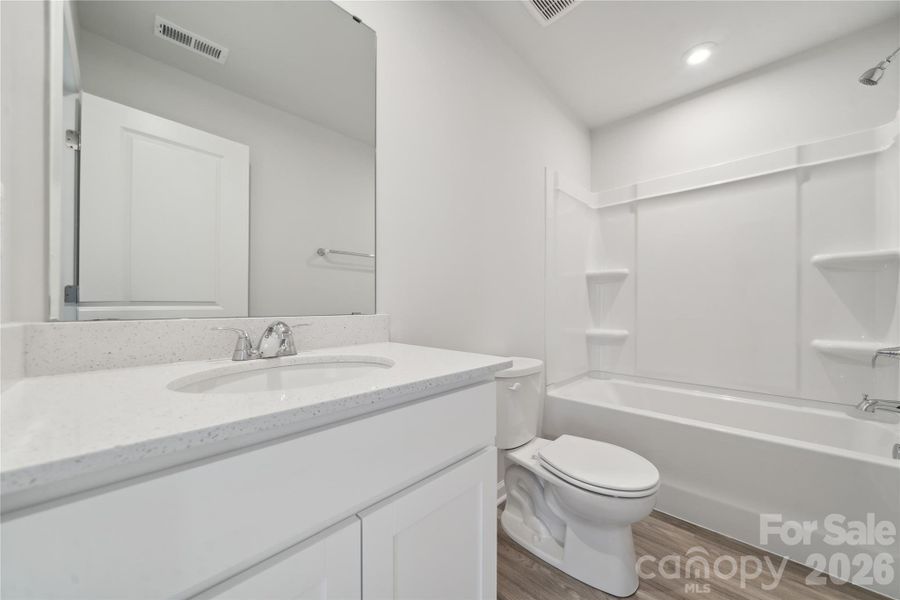 Example Photo Example Photo