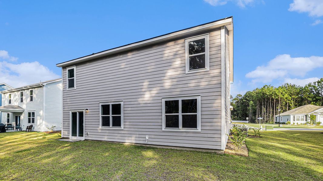Exterior details and patio area of a home in Auberon Woods, Conway (Image 3).