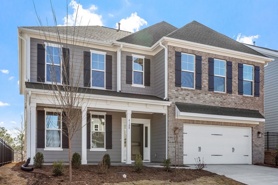 Front exterior of a new home in Sweetbrier, Durham, NC, highlighting curb appeal (Image 24).