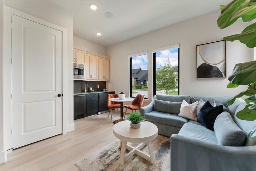 Great connection between the living space and kitchenette. The setup offers rare independence for visitors or family members staying on the first floor.