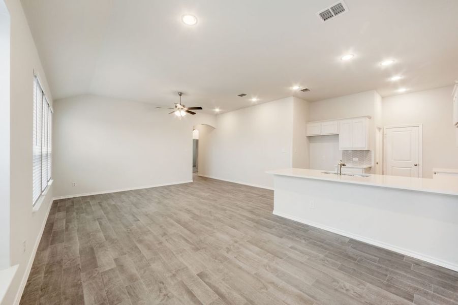 Representative exterior photo of a completed home built from the Joliet by Impression Homes in Heartland, Heartland, TX (Image 10).