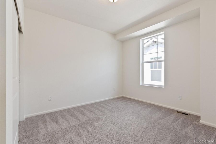 Spacious, unfurnished interior of a new home in Farmlore, Brighton (Image 21).