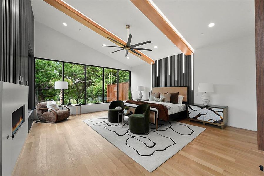 Vaulted ceilings with exposed wood beams define this spacious room
