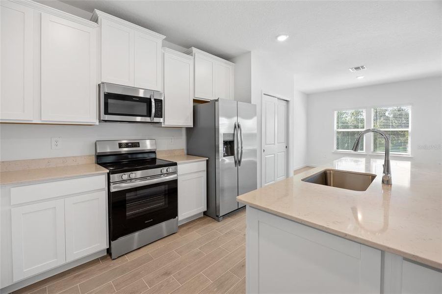 Furnished interior view inside a new home in , Dunnellon (Image 5).