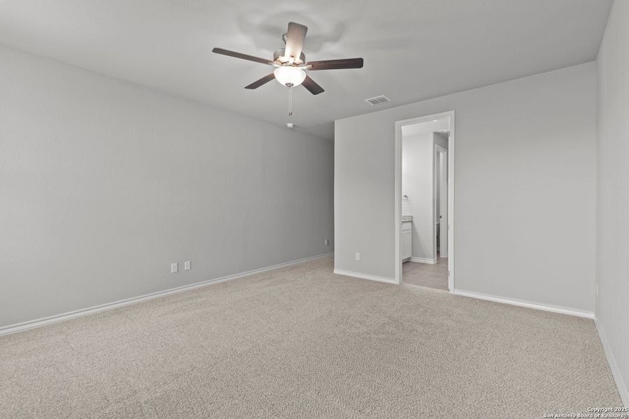 Spacious, unfurnished interior of a new home in The Reserve at Potranco Oaks, Castroville (Image 60).