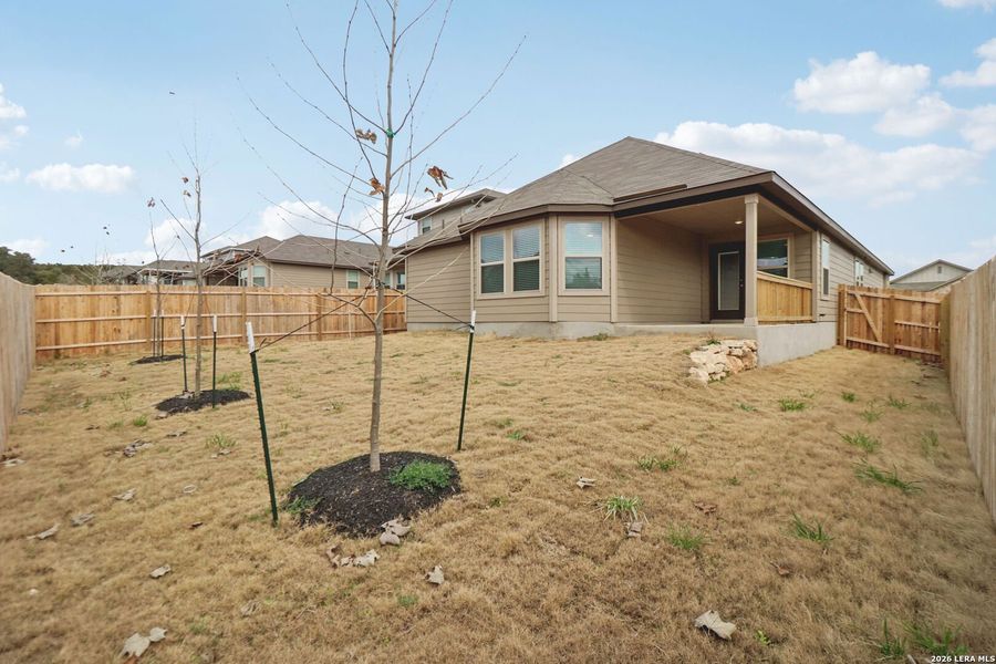 Exterior details and patio area of a home in Scenic Crest - Premier Series, Boerne (Image 3).