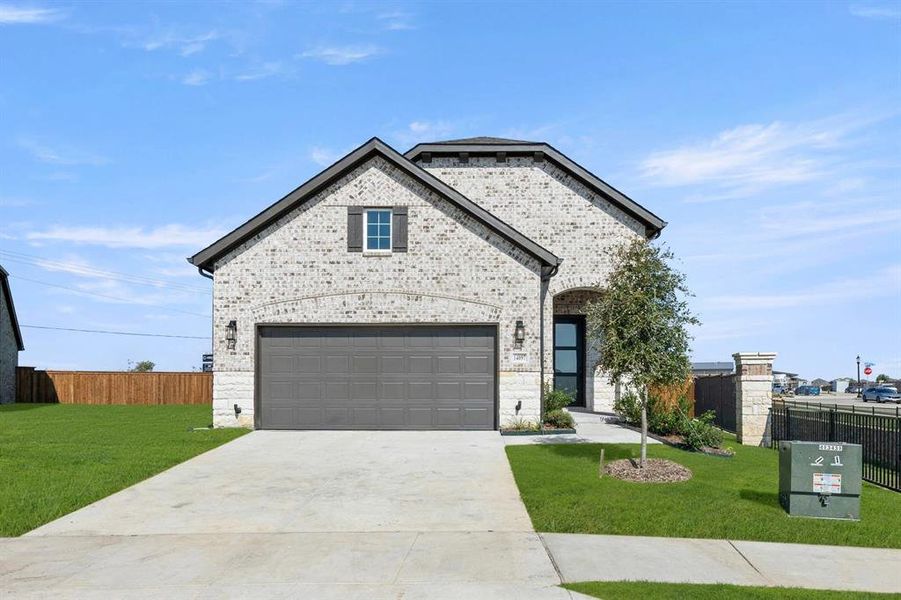 Front exterior of a new home in Creekview Fossil Ridge, Pilot Point, TX, highlighting curb appeal (Image 2).
