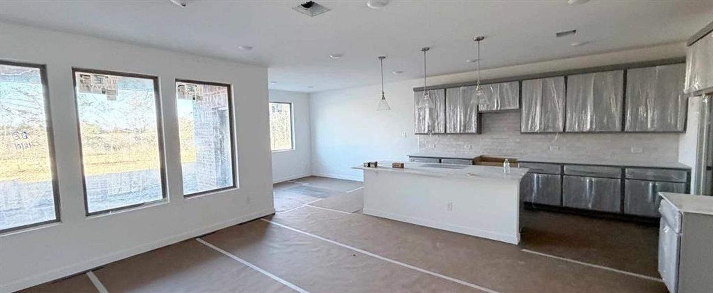 Open Kitchen-Living-Dining Room Construction Progress featuring the Milan Collection Open Kitchen-Living-Dining Room Construction Progress featuring the Milan Collection