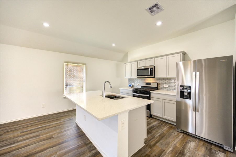 Furnished interior view inside a new home in Breckenridge Forest, Spring (Image 12).