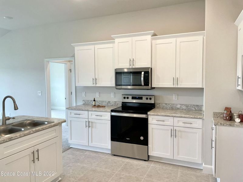 Representative furnished interior of a home built from the 1485 by Adams Homes in Winding Oaks, Weeki Wachee (Image 7). Representative furnished interior of a home built from the 1485 by Adams Homes in Winding Oaks, Weeki Wachee (Image 7).