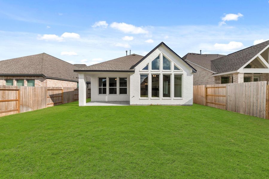 Exterior details and patio area of a home in Parmer Ranch - 40', Georgetown (Image 2). Exterior details and patio area of a home in Parmer Ranch - 40', Georgetown (Image 2).