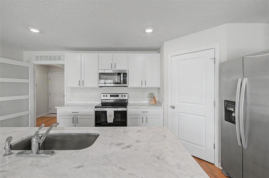 Furnished interior view inside a new home in Mandarin Grove, Palmetto (Image 8).