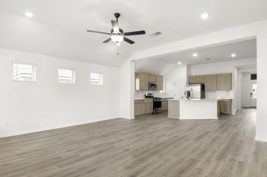 Representative unfurnished interior of a home built from the Kelley by Pacesetter Homes in Village at Three Oaks, Seguin (Image 7).