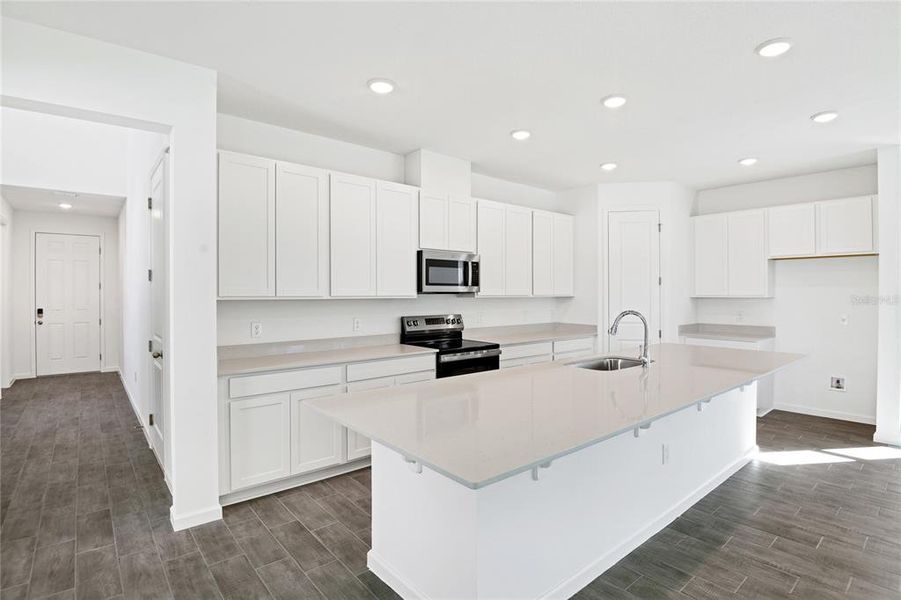 Furnished interior view inside a new home in Seasons at Shores of Lake Dell, Dundee (Image 6).