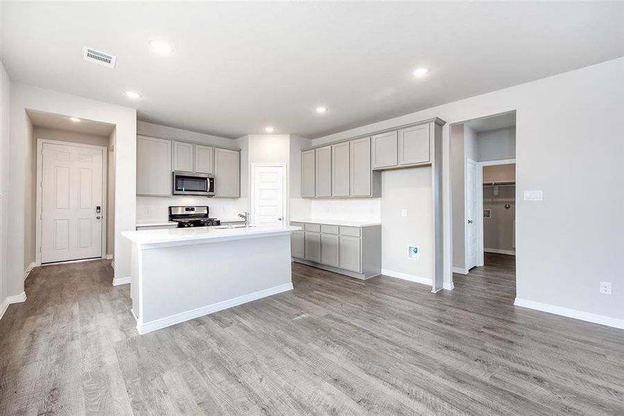 Kitchen Island Overlooking Breakfast Nook