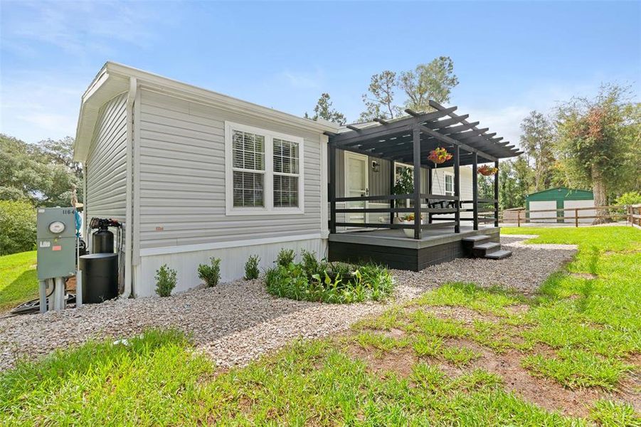 Exterior details and patio area of a home in , Brooksville (Image 30).