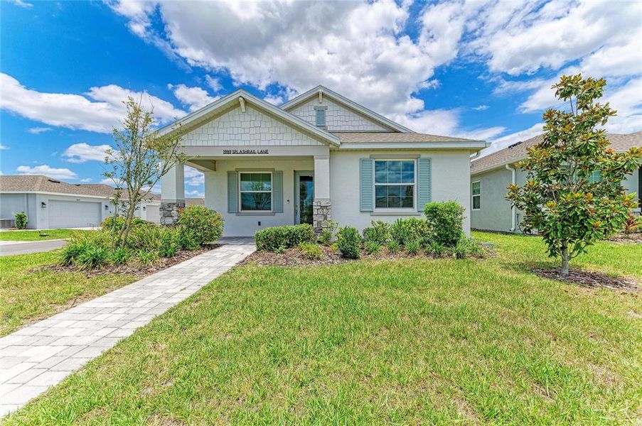 Front exterior of a new home in , Sarasota, FL, highlighting curb appeal (Image 26). Front exterior of a new home in , Sarasota, FL, highlighting curb appeal (Image 26).