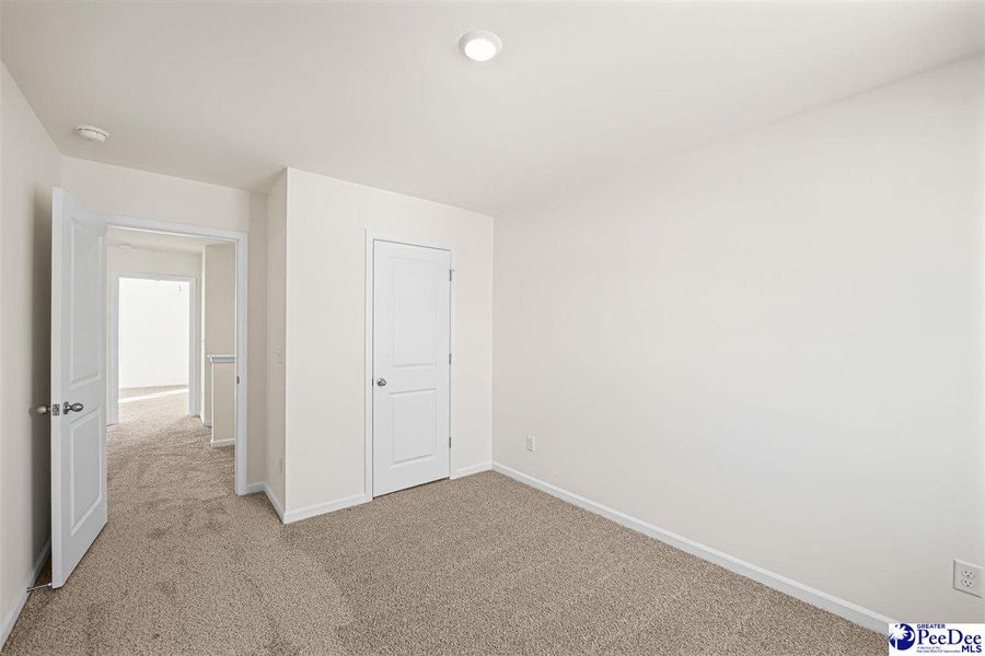 Spacious, unfurnished interior of a new home in The Grove, Florence (Image 22).