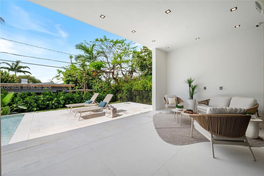 Exterior details and patio area of a home in , North Miami (Image 4).