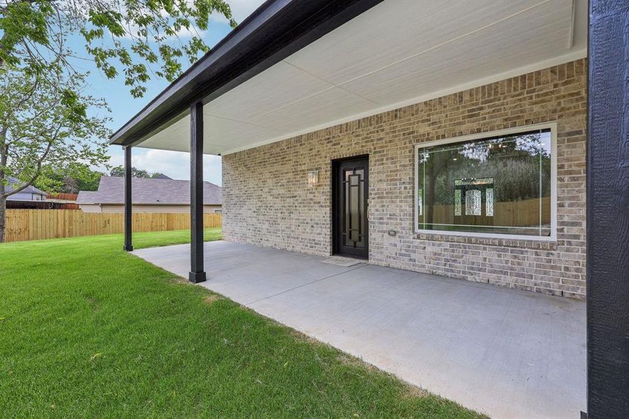 Covered patio with beautiful views.