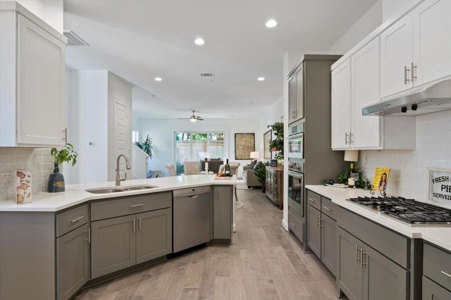 Oversized countertops, phenomenal lighting and open concept design. Images depict similar products at other ROC Homes properties.