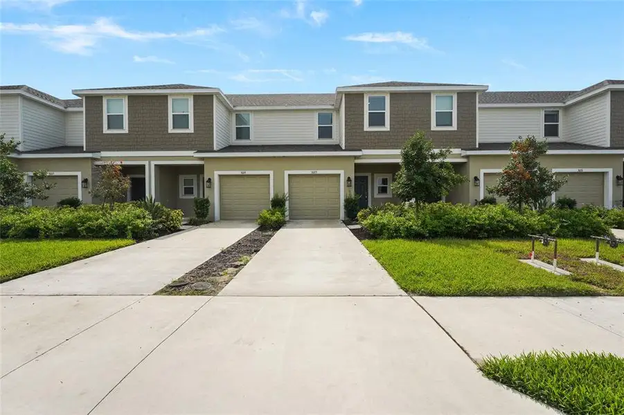 Front exterior of a new home in , Bradenton, FL, highlighting curb appeal (Image 26). Front exterior of a new home in , Bradenton, FL, highlighting curb appeal (Image 26).