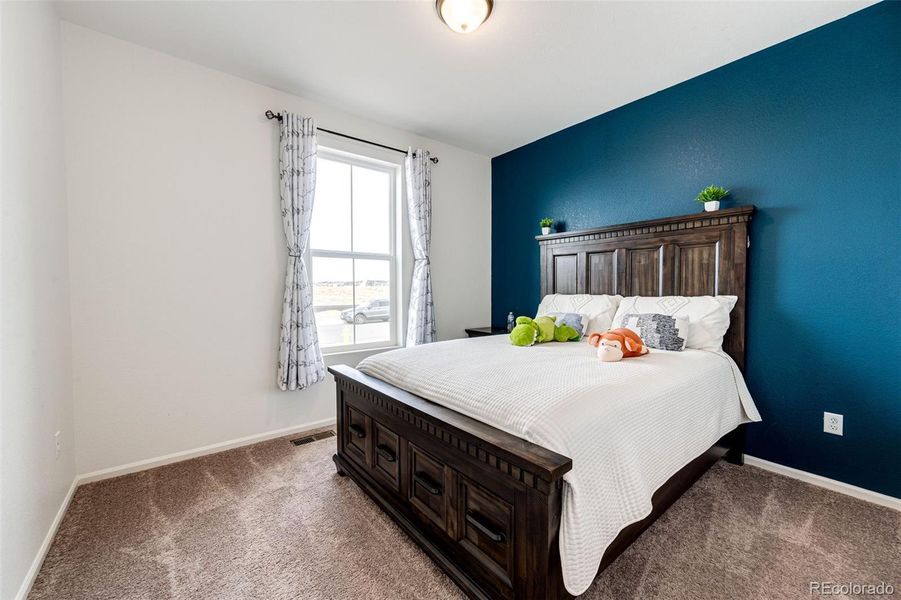 Furnished interior view inside a new home in Painted Prairie, Aurora (Image 13).