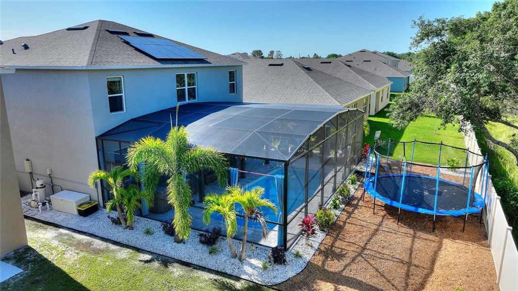 Front exterior of a new home in Squire's Grove, Winter Haven, FL, highlighting curb appeal (Image 19). Front exterior of a new home in Squire's Grove, Winter Haven, FL, highlighting curb appeal (Image 19).