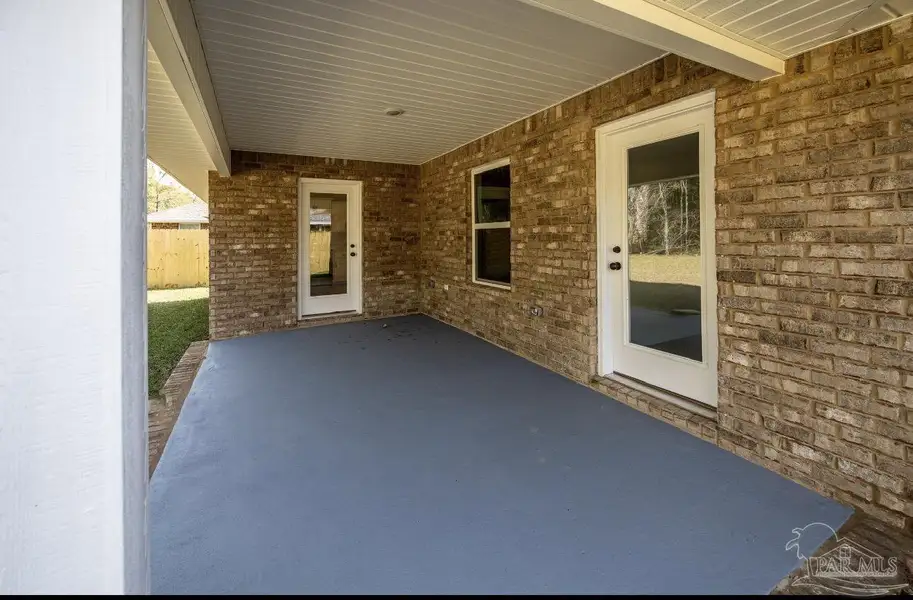 Exterior details and patio area of a home in Hidden Pines Estates, Milton (Image 3). Exterior details and patio area of a home in Hidden Pines Estates, Milton (Image 3).