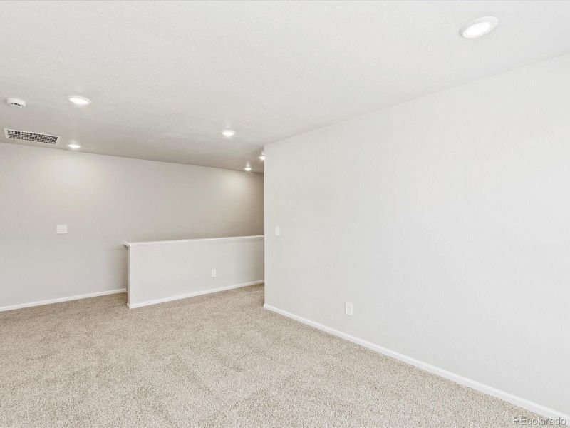 Spacious, unfurnished interior of a new home in Skyview at High Point, Aurora (Image 36).